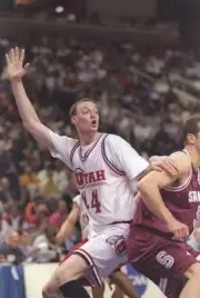 Forward Keith Van Horn Utah Utes tries to free himself from forwar- Old Photo