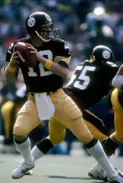 Quarterback Terry Bradshaw Pittsburgh Steelers drops back to pass- 1974 Photo 6