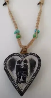 Peruvian necklace woven in macrame thread and natural stone heart of the Inca ma