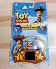 Toy Story Woody's Sheriff Round Up Edition LCD Handheld Video Game BRAND NEW