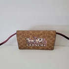 Coach CX597 Anna Foldover Signature Horse Carriage Crossbody Handbag Clutch Tan