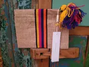 NWT Decjuba The Hunger Project Multicolored Woven Tassel Clutch Purse