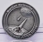 MARTIAN METEORITE WITH COLLECTORS COIN, NORTH WEST AFRICA 13190 MT103