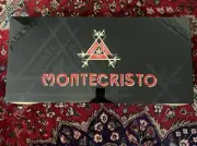 NEW/UNUSED MONTECRISTO HUMIDOR-BLACK, RED AND GOLD 29” WIDE 14” DEEP AND 8” TALL
