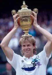 Stefan Edberg of Sweden lifts the trophy after defeating Boris Be - Old Photo 1