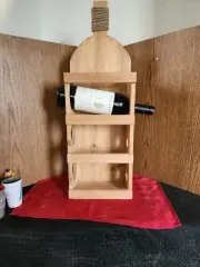 2554. NEW OLD TIME POTTERY PINE WOOD WINE BOTTLE HOLDER. HOLDS 3 BOTTLES