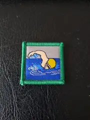 Old System Australian Cub Scout Merit Badge - Swimming Level 1 white backing