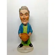 Whimsical Distinguished Man Standing Holding Hat Ceramic Figure Matte Finish