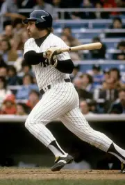 Catcher Thurman Munson New York Yankees swings and watches the fl- 1976 Photo