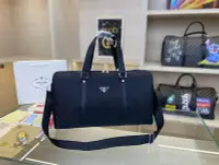 在飛比找Yahoo!奇摩拍賣優惠-小Z代購#Prada 普拉達 旅行袋 機場包 衣物包 手提包