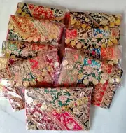 Wedding favors return gifts patchwork assorted small banjara clutch pompom bag