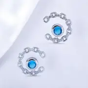 Rhodium Plated with Blue Topaz Cubic Zirconia Stud Earrings