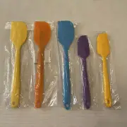 Set Of Three Multicolored Large Silicone Spatulas And Two Scrapers