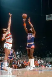 Truck Robinson of the Phoenix Suns shoots 1980's Basketball Photo 1