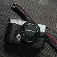 在飛比找Yahoo!奇摩拍賣優惠-適用奧林巴斯E P7相機套底座Olympus ep7保護套真