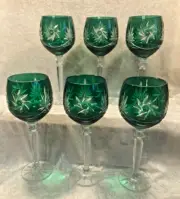 SET OF 6 EMERALD GREEN STARBURST CRYSTAL WINE GLASSES IN ORIGINAL BOX.