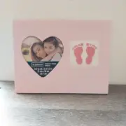 Finished completed cross stitch frame baby feet pink girl 1
