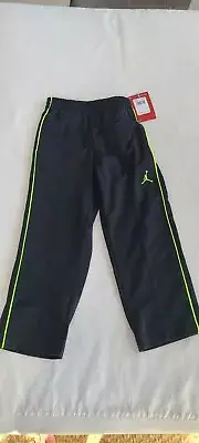 New Air Jordan kids boy size 4 black & lime athletic pants was $43