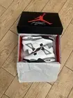 Jordan 4 White Cement (2025)