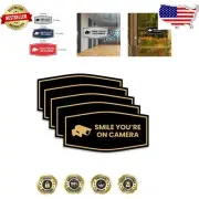 Durable Black Gold Security Signs - 5 Medium 'Smile You’re On Camera' Packs