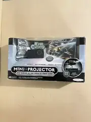 Jakks Pacific Mini Eye Cyclops Projector,MP3-Video Games-DVD