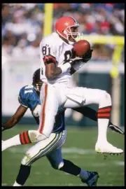 Wide receiver Michael Jackson Cleveland Browns tries to break a- 1995 Old Photo