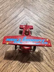 vintage metal toy airplane