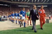 Everton and Liverpool are led out by their managers, Colin Harvey - Old Photo
