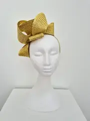 Miss Samantha. Womens loop headband fascinator in Metallic gold