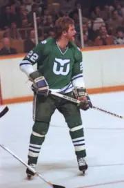 Jeff Brubaker of the Hartford Whalers skates against the - Ice Hockey Old Photo