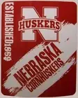 Blanket Fleece Throw NCAA Nebraska Cornhuskers NEW 50”x60 with protective sleeve