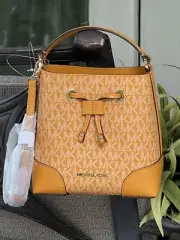 MICHAEL KORS MERCER SMALL XS BUCKET DRAWSTRING CROSSBODY GALLERY BAG YELLOW LOGO