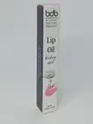 Billion Dollar Beauty Clear to Pink Tinted Lip Oil Blushing Effect Full Size