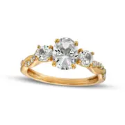 Oval White Lab-Created Sapphire and 0.10 CT. T.W. Diamond Antique Vintage-Style Ring in Solid 10K Yellow Gold