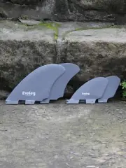 4.9" / 3.1" RM quad set of four fins, ash colour Pro Glass. FCSII compatible.