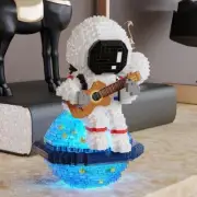 1423pcs Guitar Astronaut Model Luminous Assembled Educational Building Block Toy