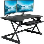 Escritorio de pie ajustable en altura de 40" con toma de CA y cargador USB - G