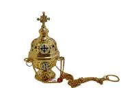 Brass orthodox incense burner hanging or stand on the table with crosses on side