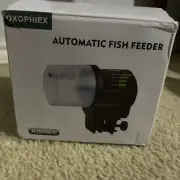 DXOPHIEX Automatic Fish Feeder Food Dispenser Vacation Fish Feeder. OPEN BOX