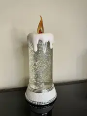 Illuminated Swirling Glitter Candle W/ Christmas Snowmen Scene