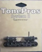 TP7-B TonePros 7 String Metric Tune-o-Matic Bridge (large posts) Black Finish