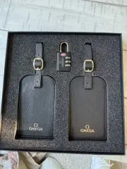 Omega Luggage Tags and Luggage Lock. Brand New