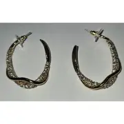 Gold tone pave simulated stones post hoop earrings.