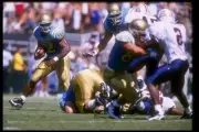 Running back Skip Hicks of UCLA carries the football at the Bruins- Old Photo 2