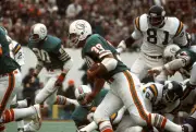Larry Csonka Miami Dolphins carries the ball v the Minnesota Viki- 1974 Photo 2
