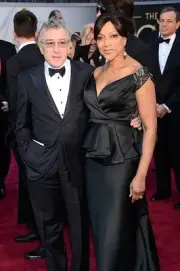 Actor Robert De Niro Grace Hightower arrive at the Oscars held at - 2013 Photo