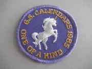 Girl Scout Embroidered Patch G.S. Calendars 1985 Unicorn Purple & White