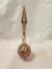 Gold Luster Perfume Bottle With Pink And Gold Oilspot Design.