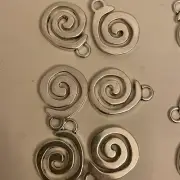 BULK 56 Spiral pattern charms antique silver tone