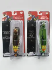 NIB WORLD of NINTENDO DONKEY KONG ATV ,LUIGI KART with LAUNCHER